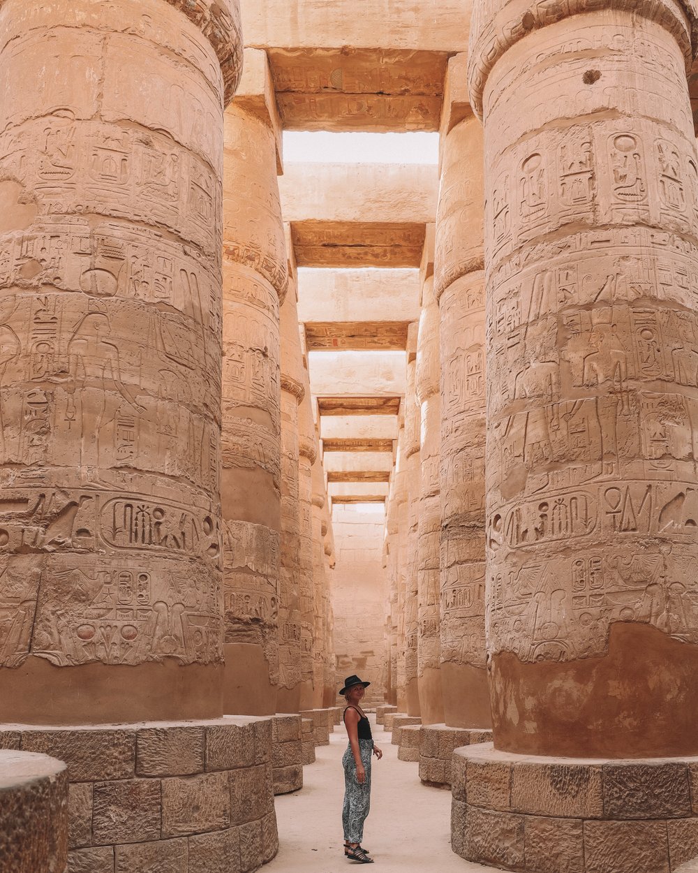 Walking through the columns - Great Hypostyle Hall - Karnak Temple - Luxor - Egypt
