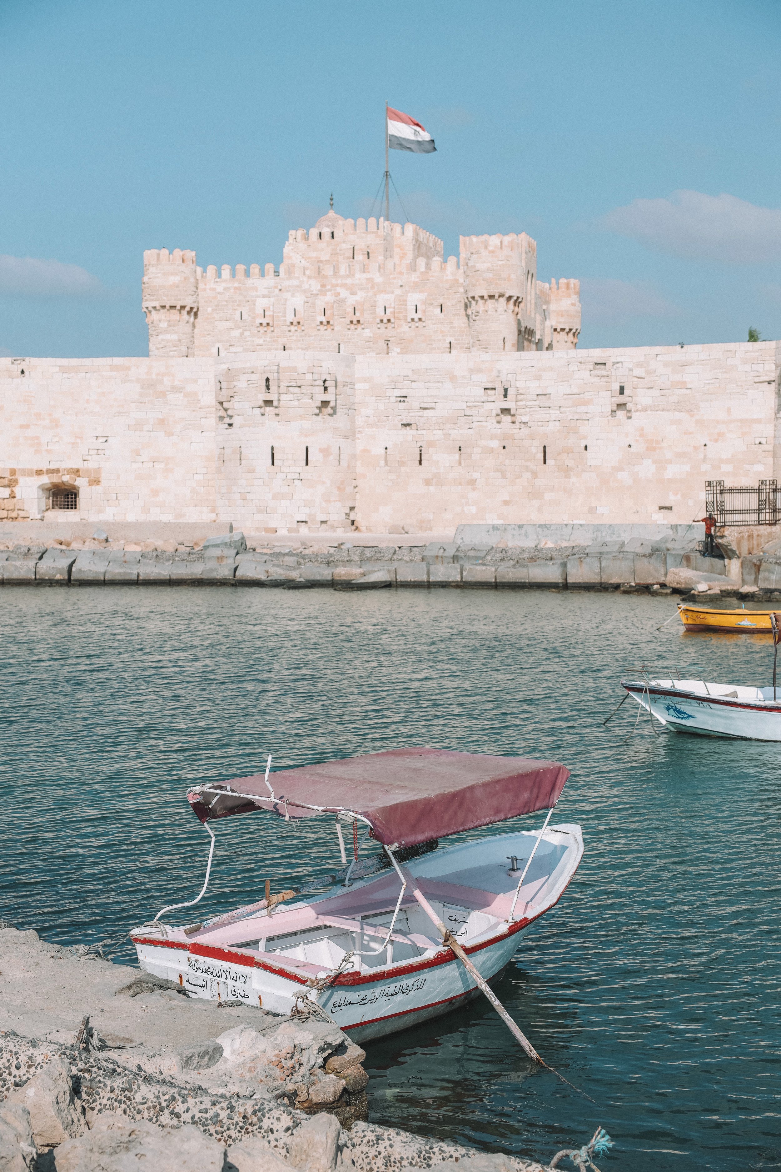 A boat parked in front of the citadel - Citadel of Qaitbay - Alexandria - Egypt
