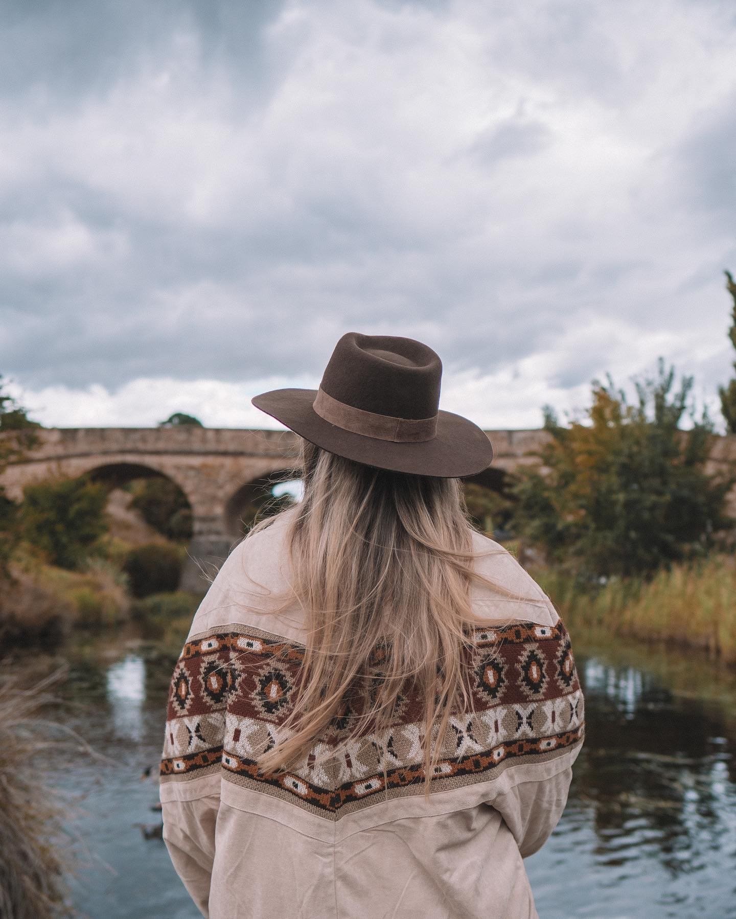 Posing in front of the bridge by cloudy weather - Richmond - Tasmania - Australia