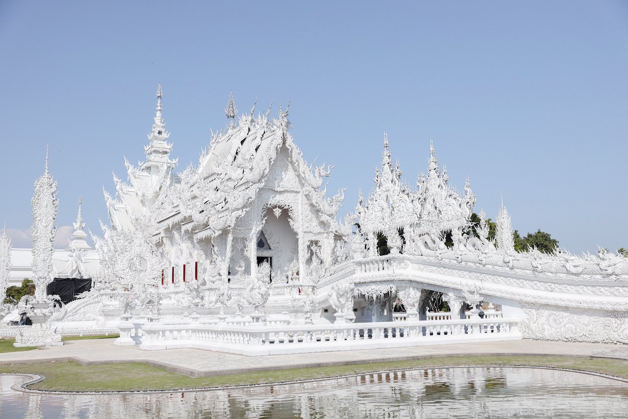 Temple and bridge in landscape - White Temple (Wat Rong Khun) - Chiang Rai - Northern Thailand