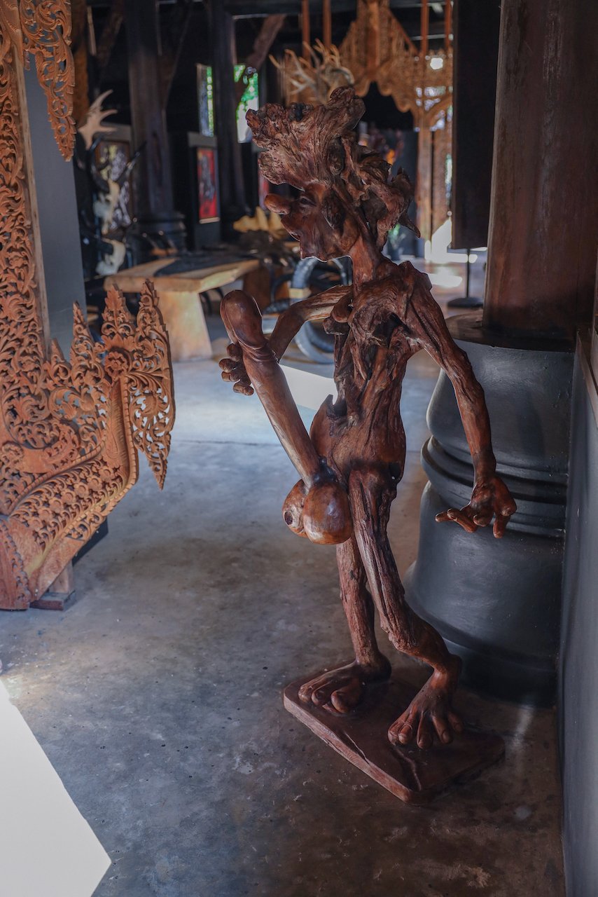 Wooden sculpture, man with a giant penis - Black House (Baan Dam Museum) - Chiang Rai - Northern Thailand