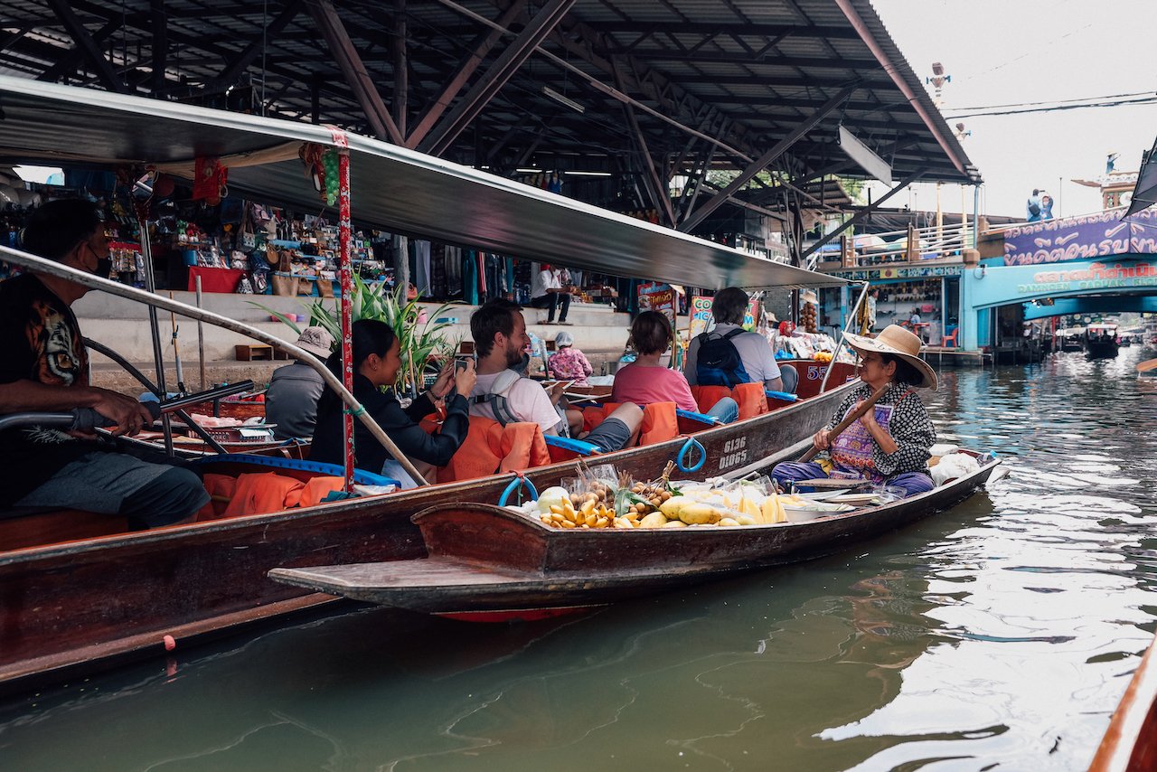 A lady selling fruits - Damnoen Saduak Floating Market - Bangkok - Thailand