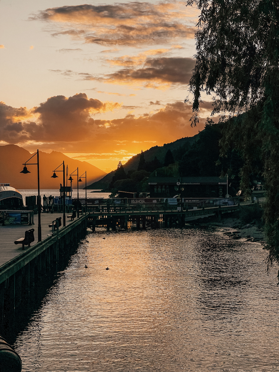 Beautiful sunset by the wharf - Queenstown - New Zealand