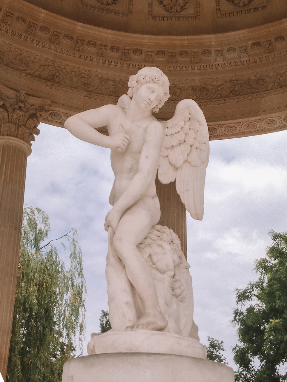 Closeup on the angle statue - Temple of Love - Estate of Trianon - Versailles Palace - France