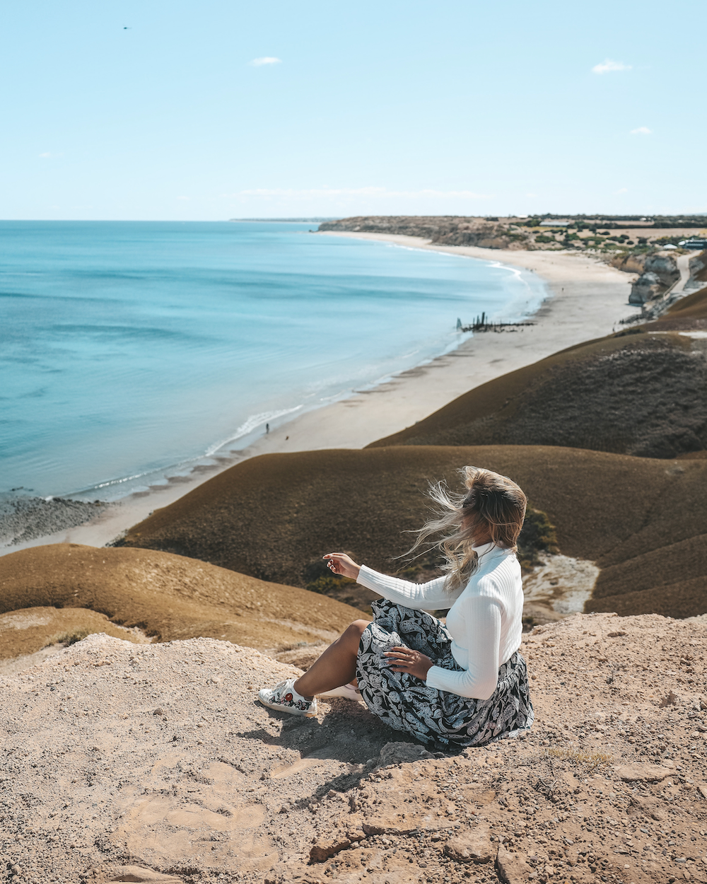 Woman sitting to admire the view at Port Willunga - McLaren Vale - South Australia (SA) - Australia