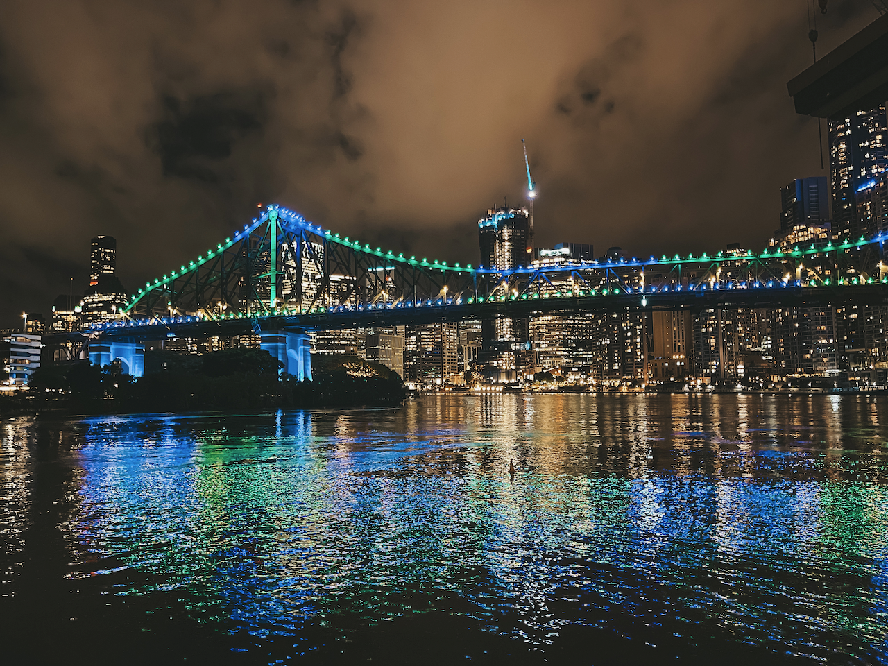The Story Bridge lit up at night from Howard Smith Wharves - Brisbane - Queensland - Australia