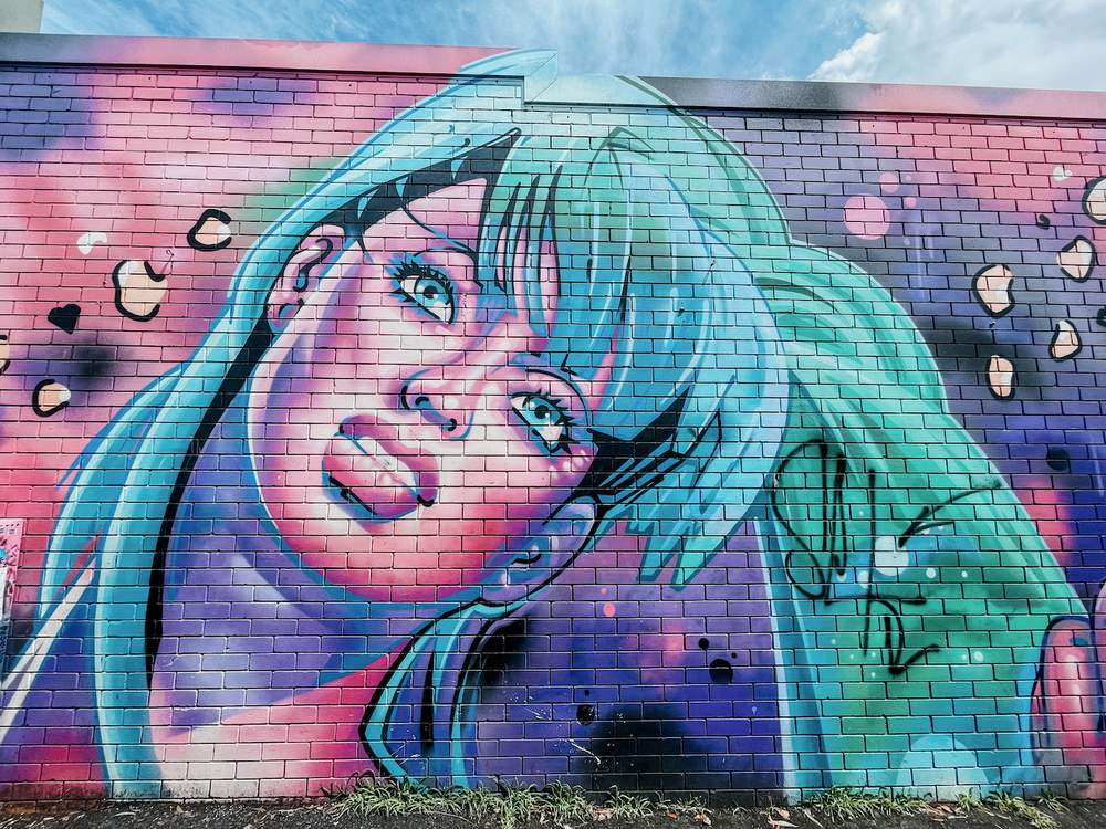 Crazy girl with blue hair graffiti - Byron Bay - New South Wales - Australia