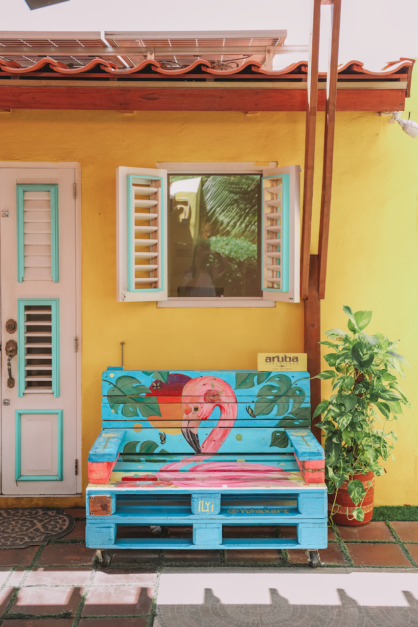 Cute flamingo bench at Aruba Experience Cafe - Aruba - ABC Islands