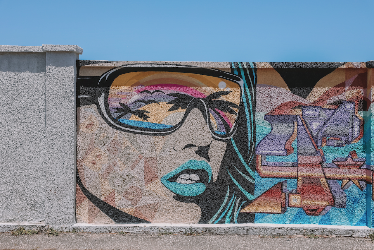 Woman wearing sunglasses graffiti in San Nicolas - Aruba - ABC Islands
