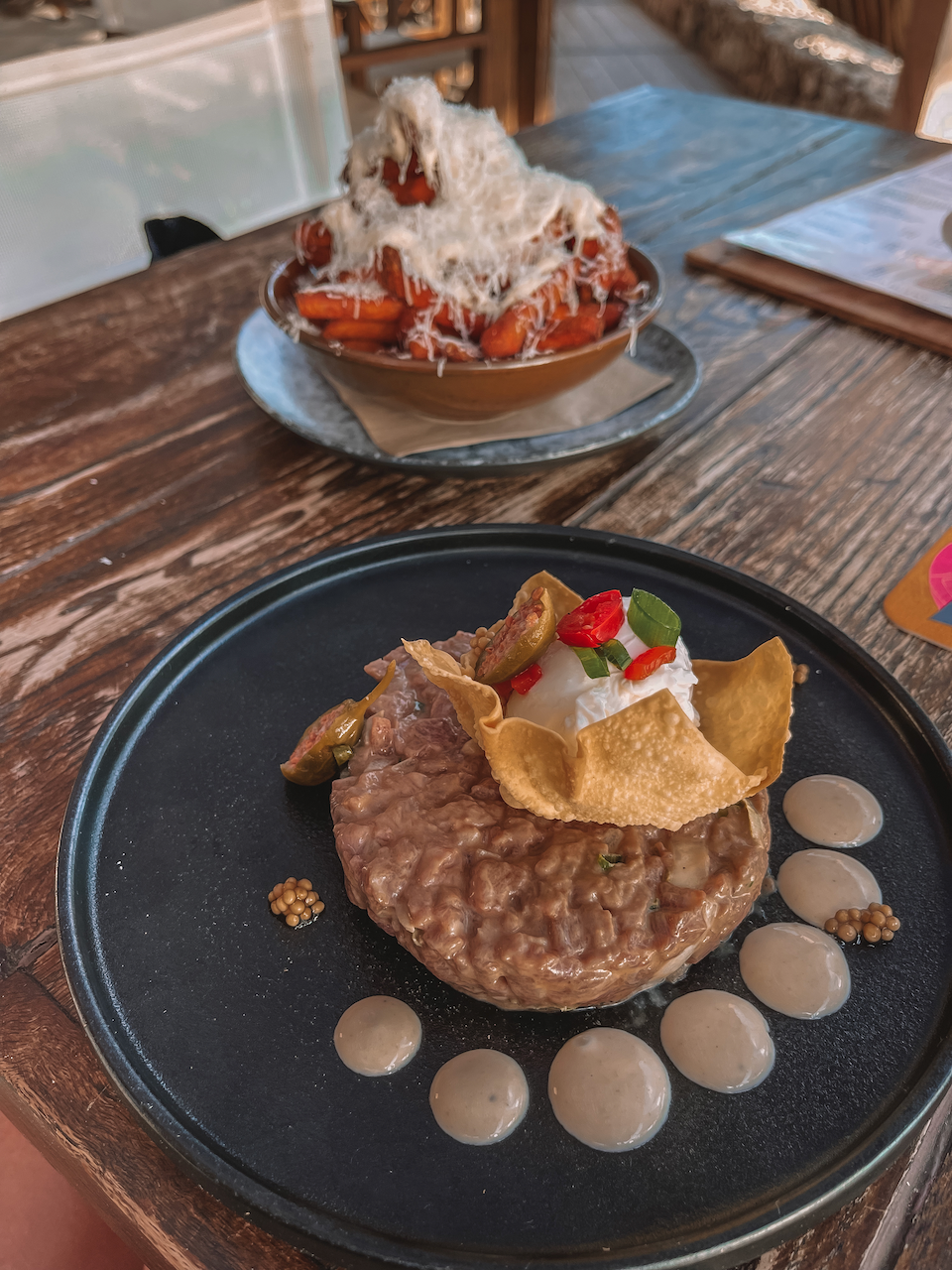 Steak tartate and truffle fries from Oasis Oasis Beach Club - Bonaire - ABC Islands