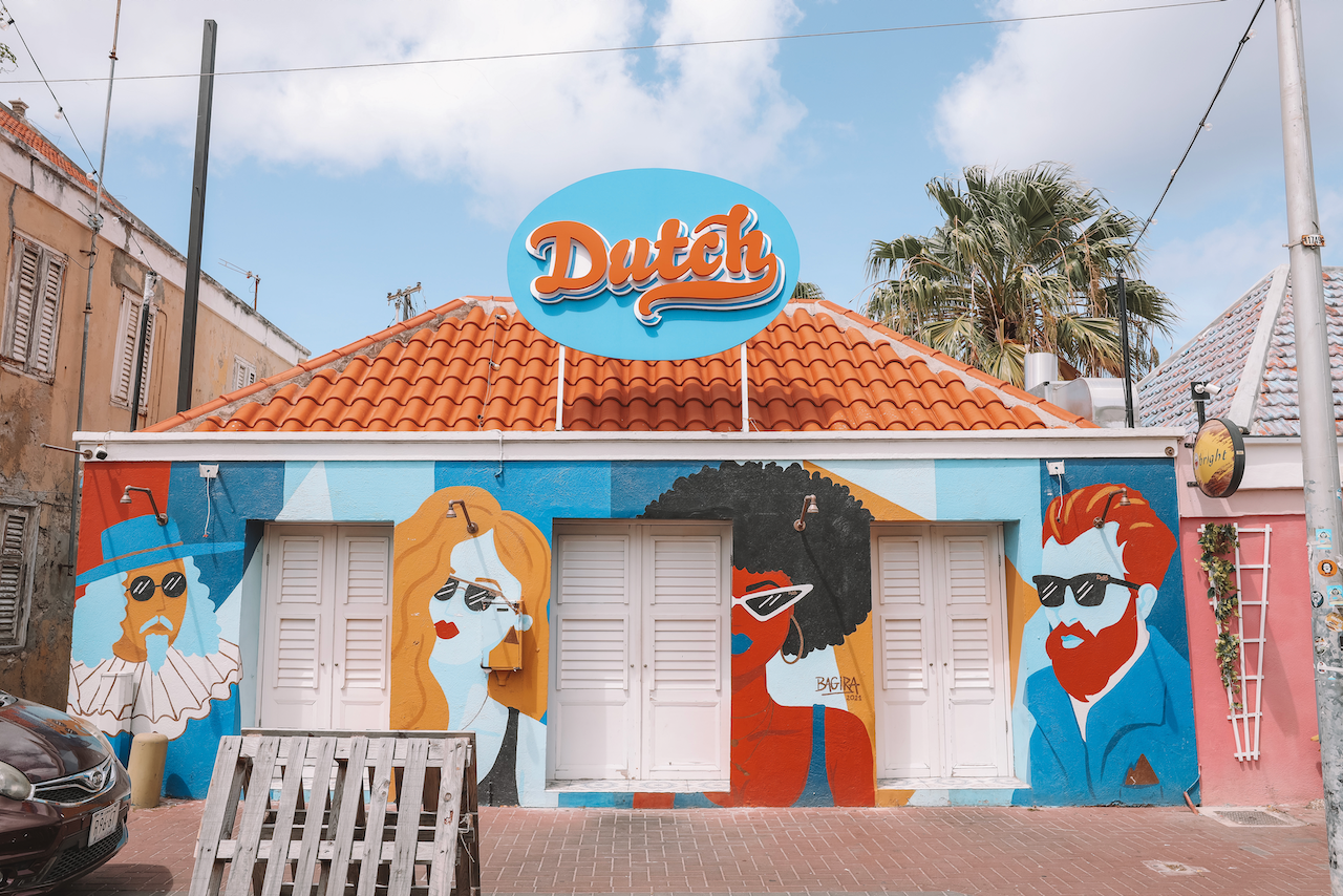 Dutch building with faces graffitis - Willemstad - Curaçao - ABC Islands