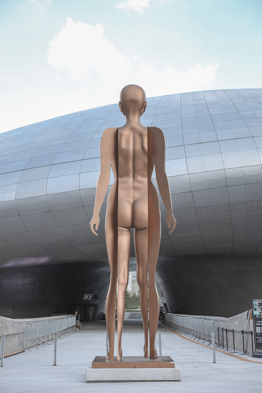 Golden statue in the front of Dongdaemun Design Plaza - Seoul - South Korea