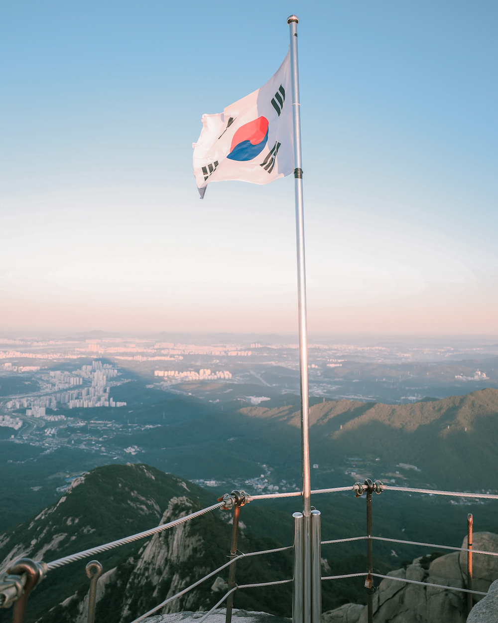 South Korea flag on top of Baegundae Peak - Seoul - South Korea