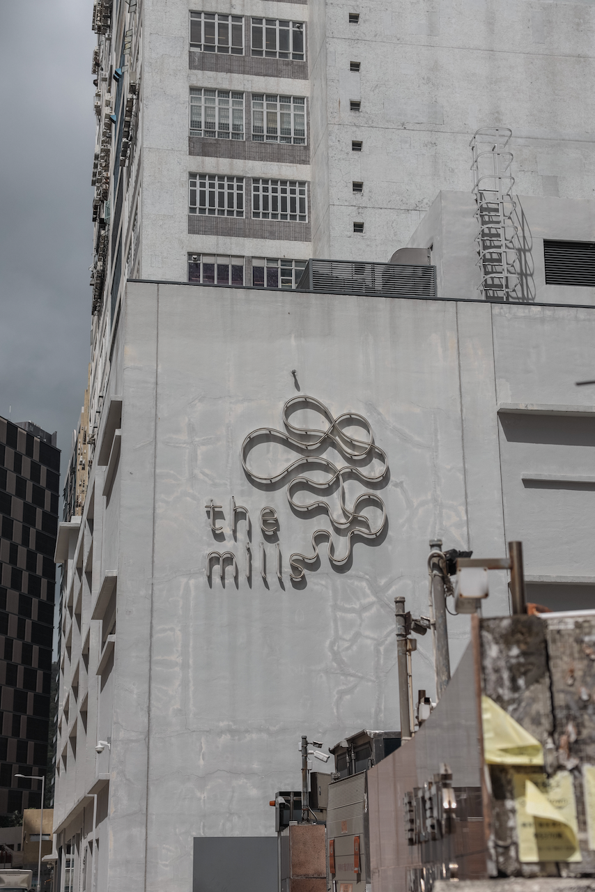 The Mills sign on the building - Hong Kong