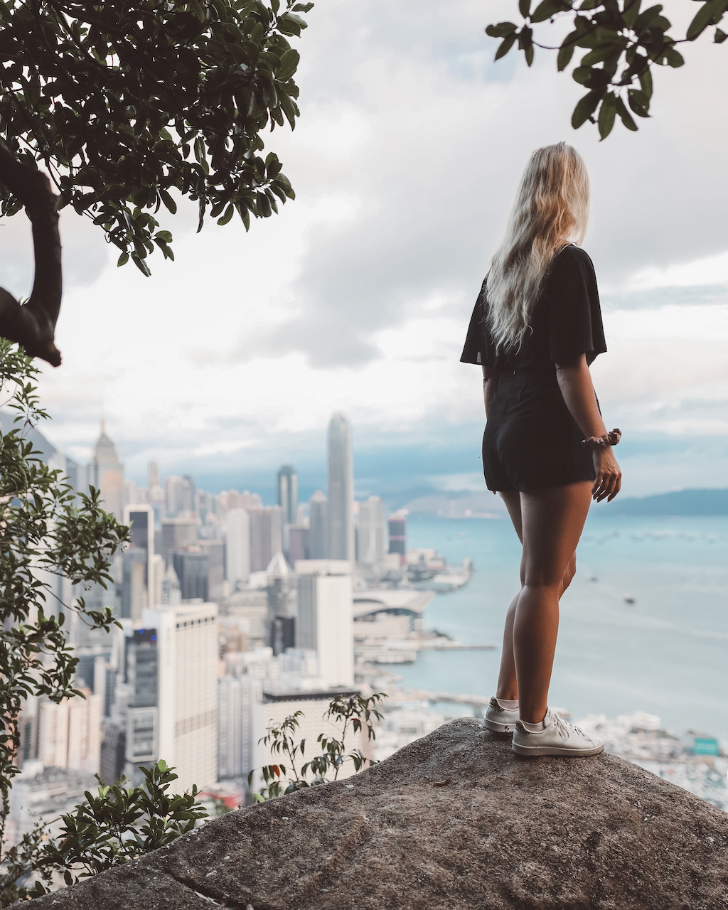 Blond woman posing at Braemer Hill Lookout - Hong Kong
