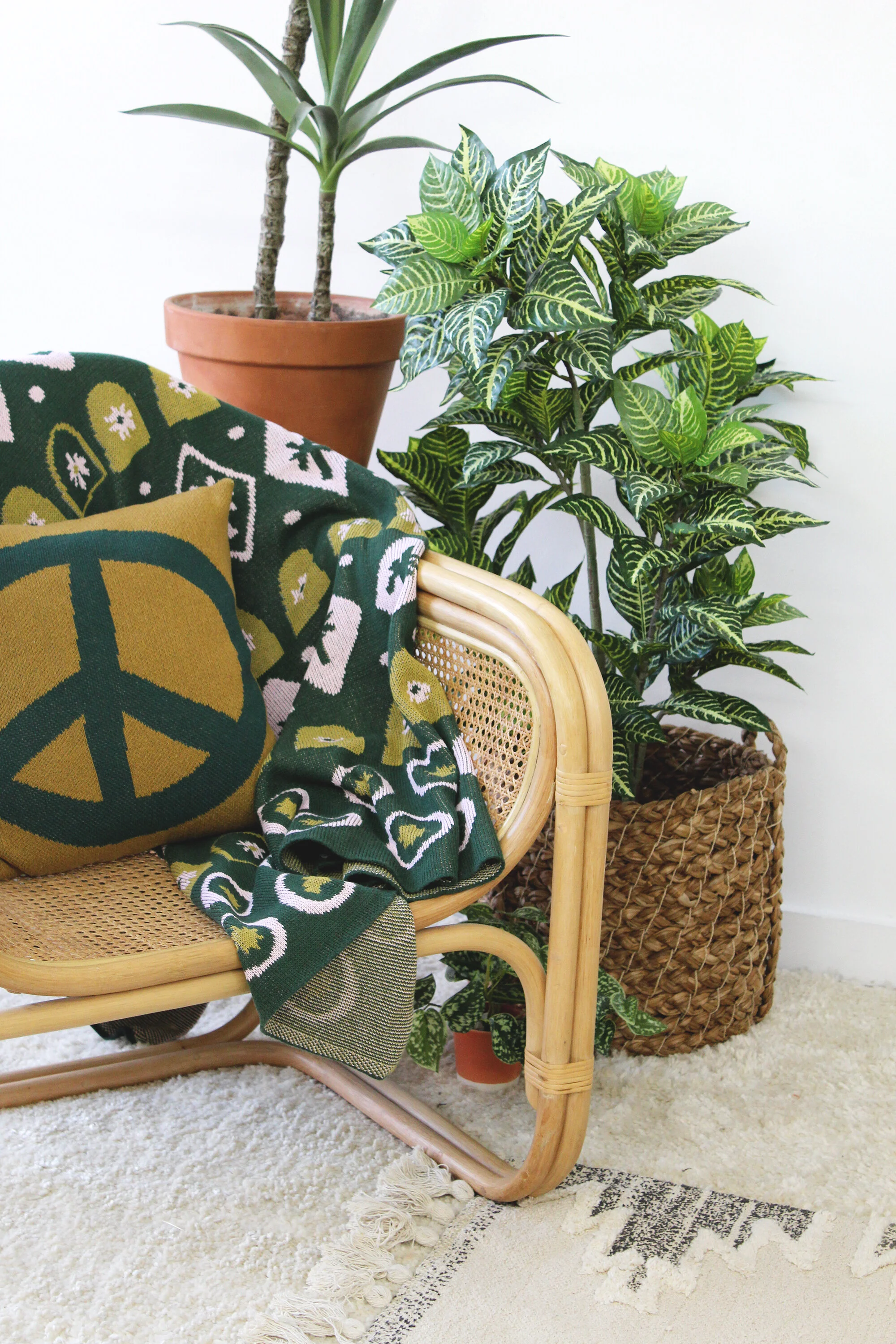 Peace Sign Pillow in Woodstock Green by Calhoun & Co.