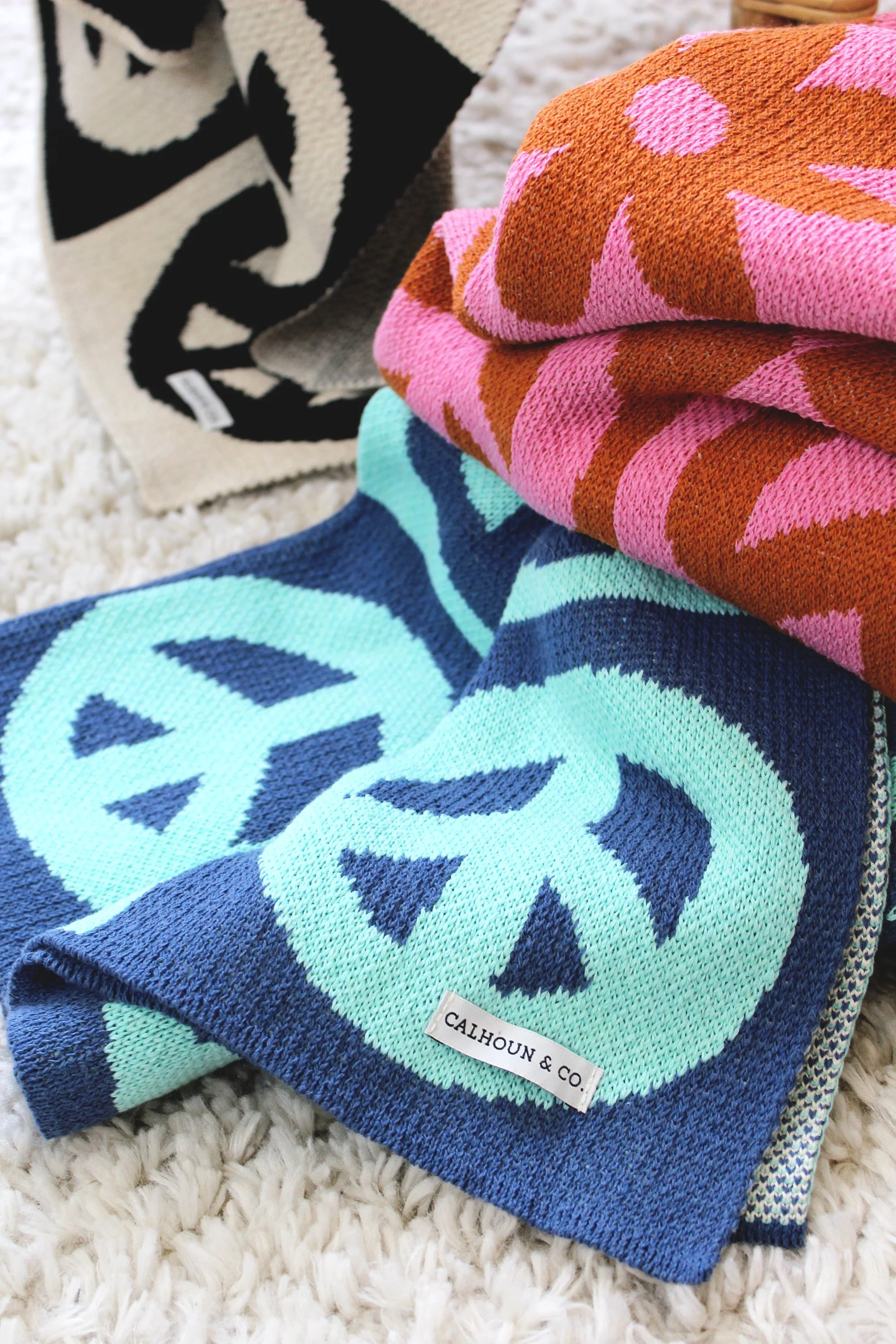 Peace Sign Blanket by Calhoun & Co. Checkered Peace Flower Knit Throw Blanket NYC Home Decor Teal Blue Dorm Room