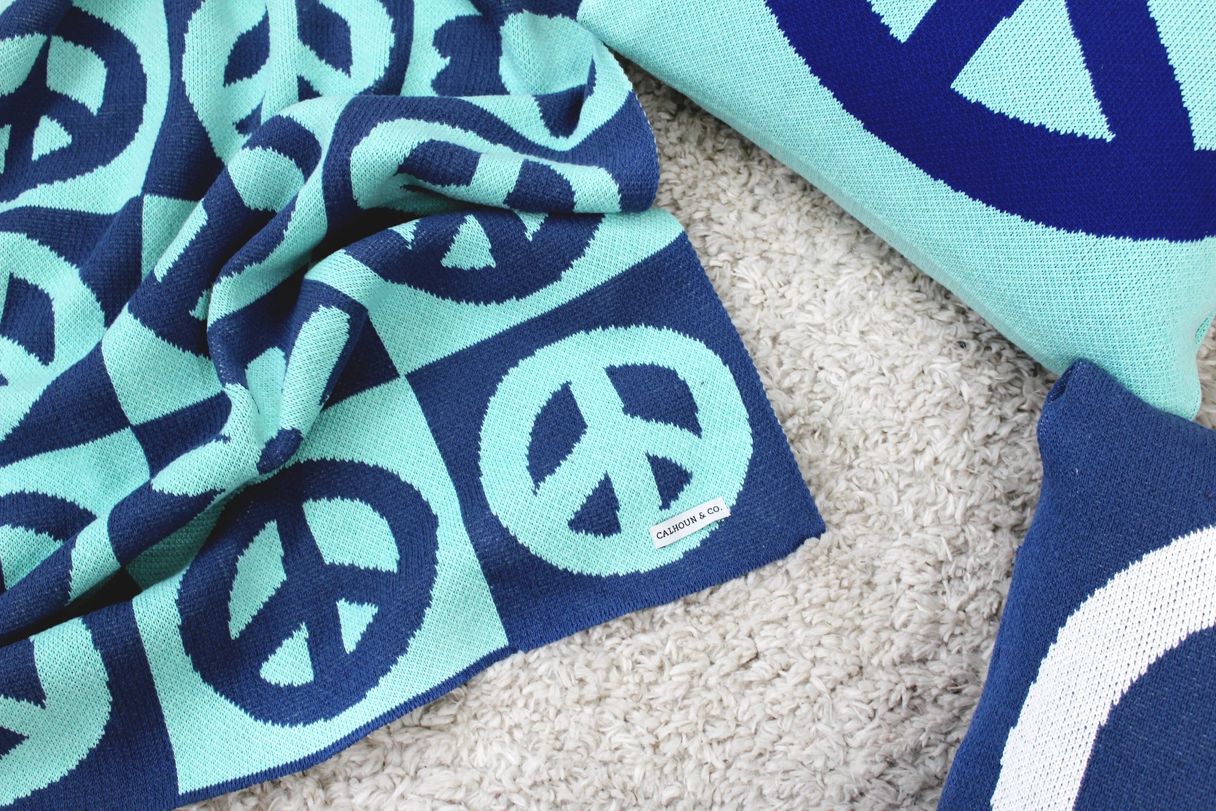 Peace Sign Blanket by Calhoun & Co. Checkered Peace Flower Knit Throw Blanket NYC Home Decor Teal Blue Dorm Room
