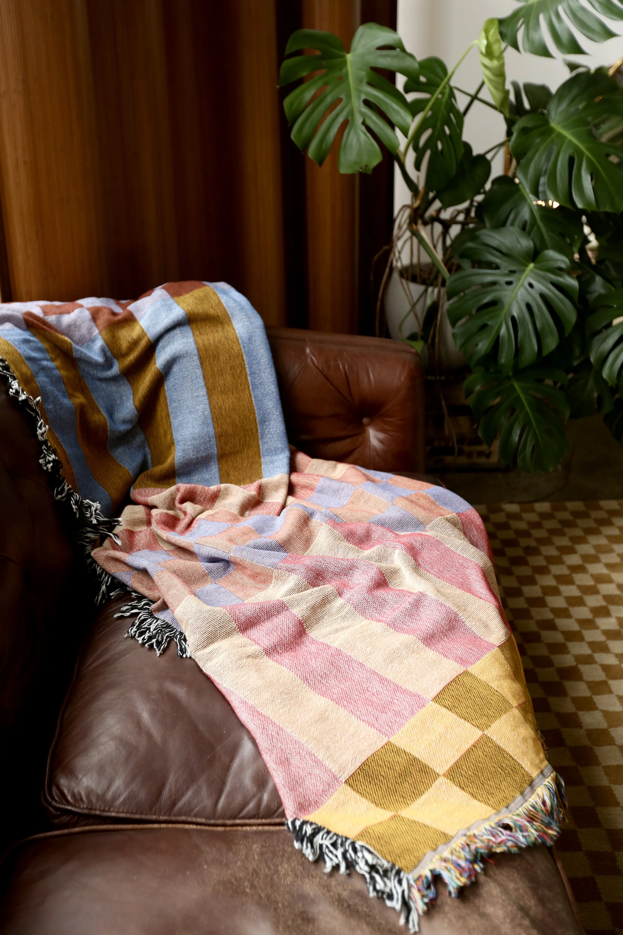 Checkered Stripe Blanket in Fort Tilden Queens Beach by Calhoun & Co.