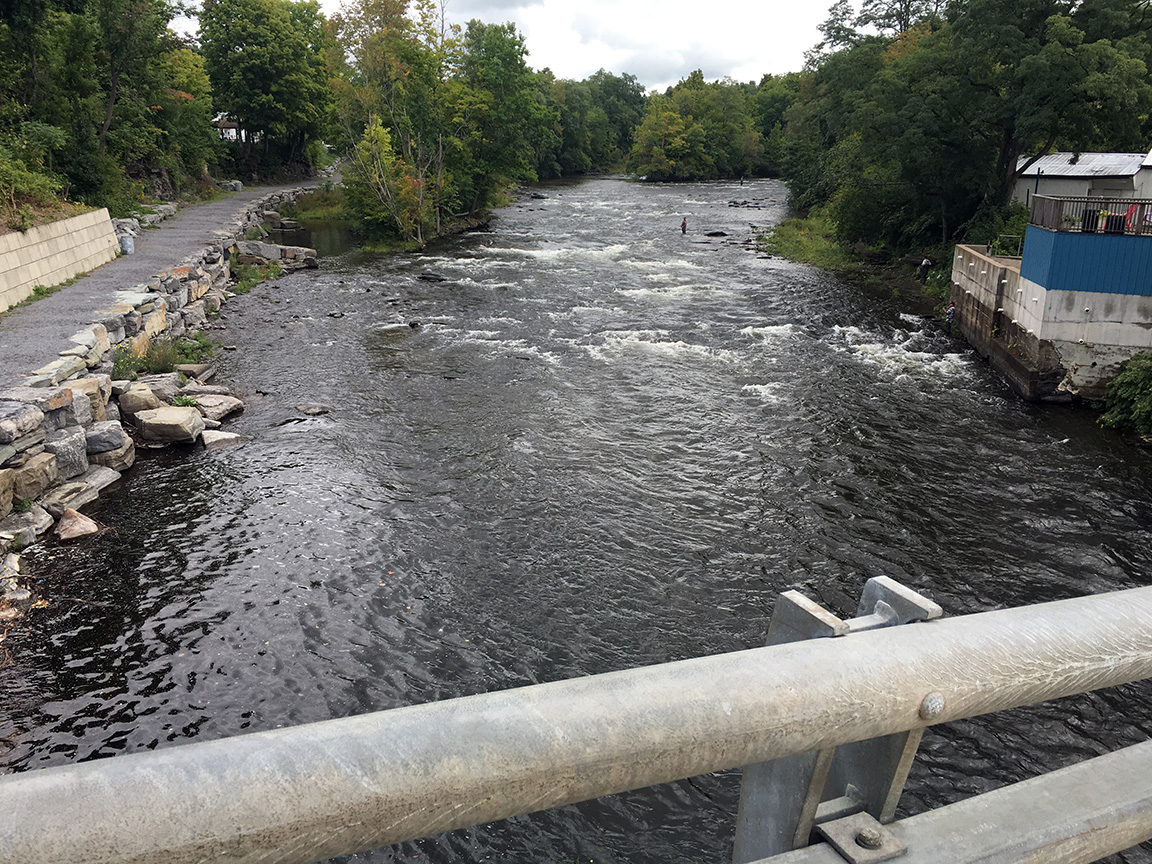 Looking upstream from the bridge at the Town Pool.