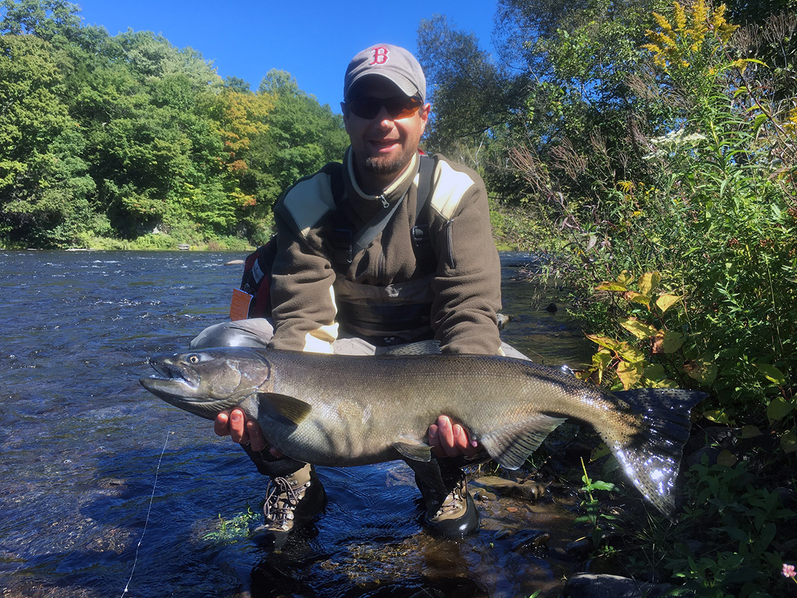Matt was all smiles after landing his first Salmon River Chinook.
