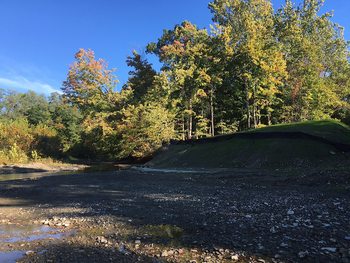 The west side view of the area below the Legion Hole where they tore down the bridge.