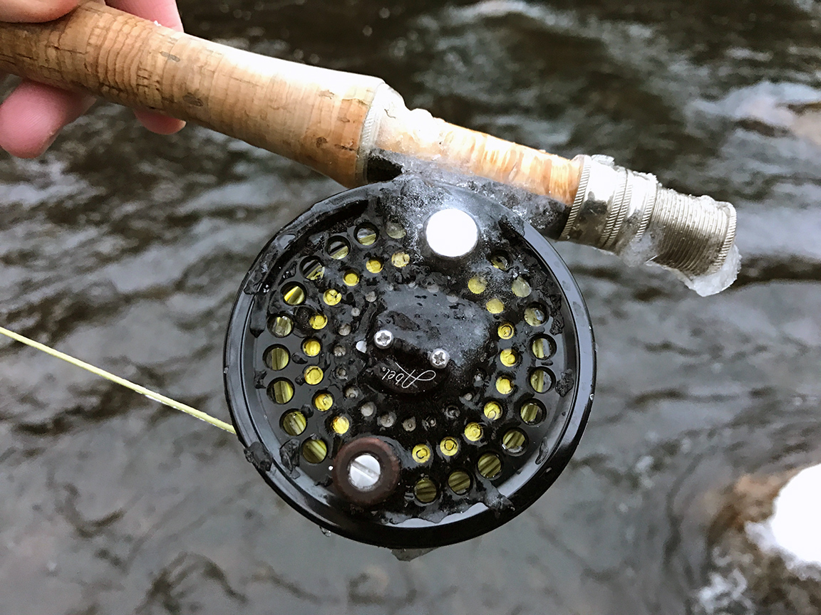 After a good session of fishing, ice coated my Abel reel and locked it up.