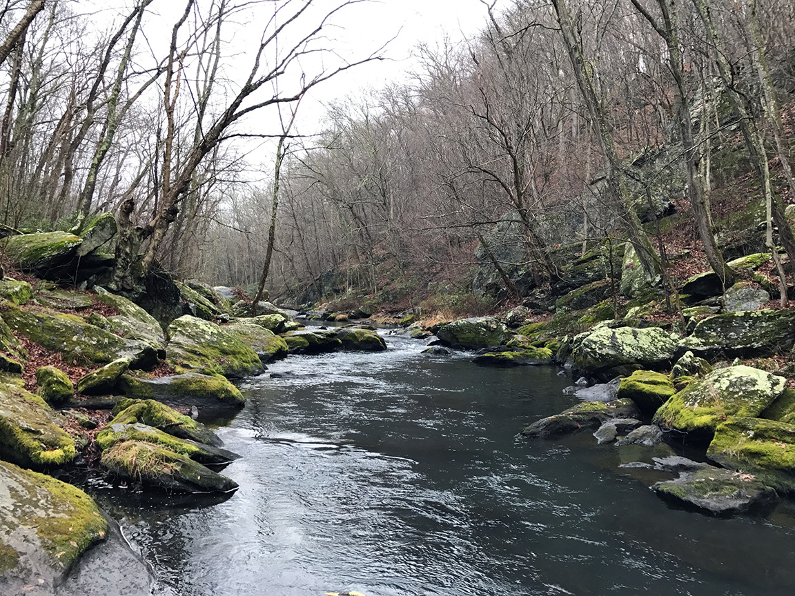 Closer to the dam, the Gunpowder narrows and is strewn with large boulders.