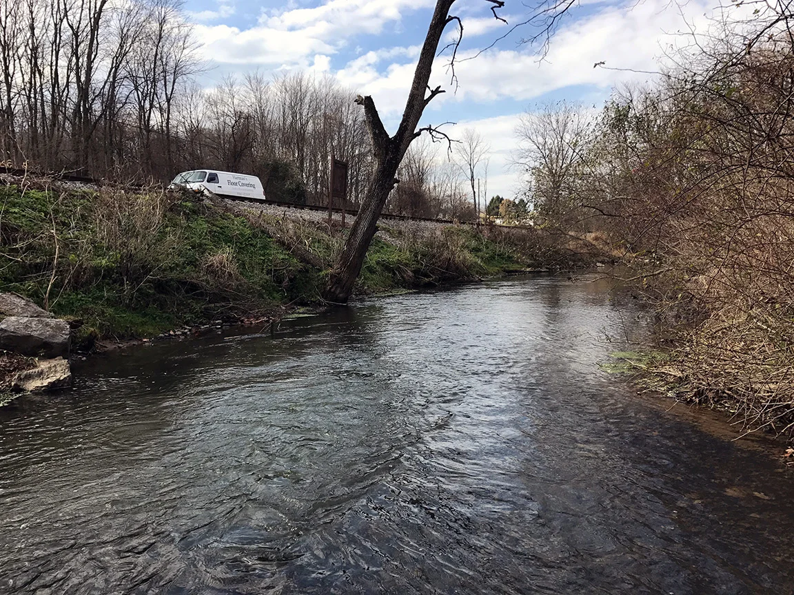 The parking area along the railroad tracks on Porters Road.