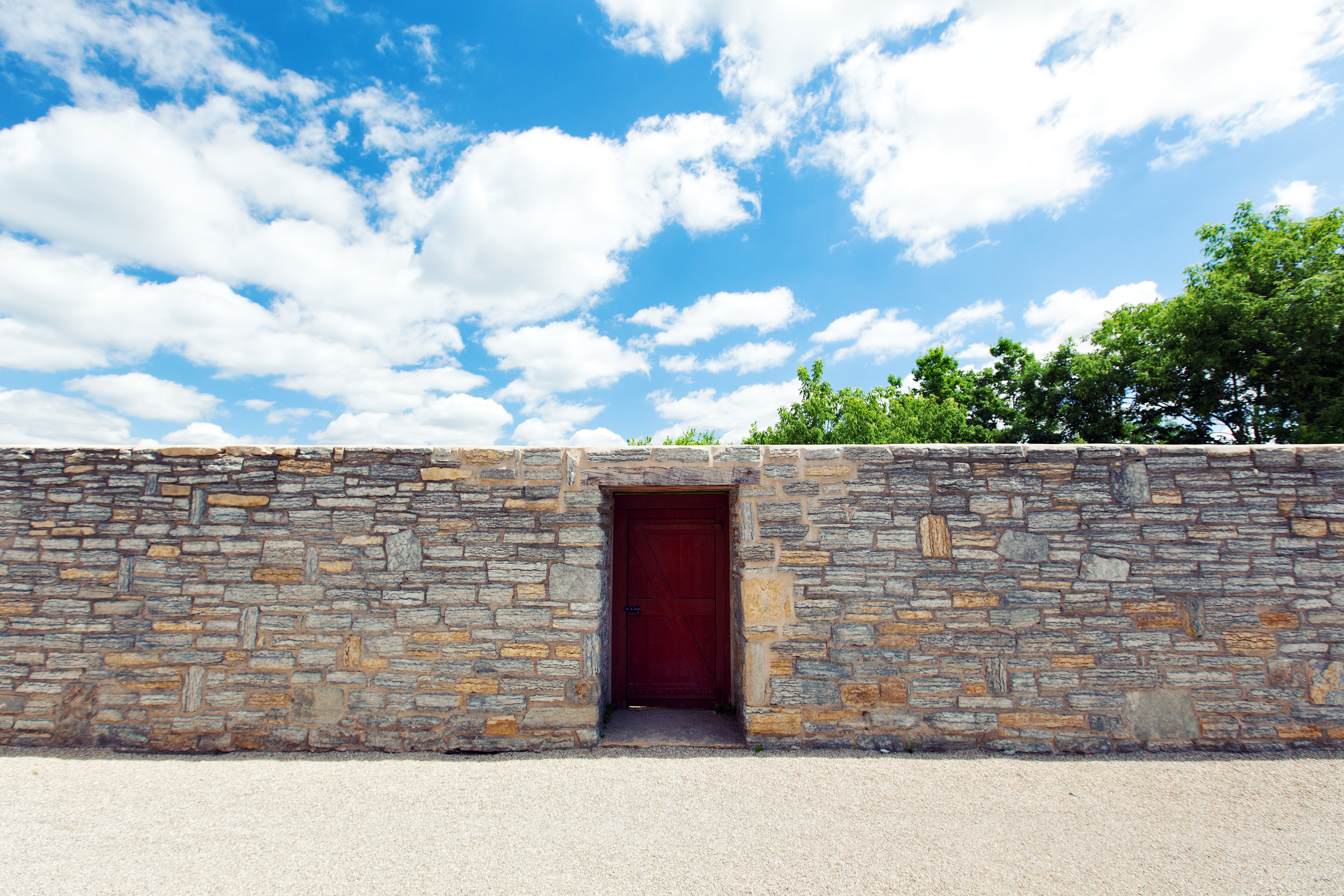 Red Door + Stone Wall