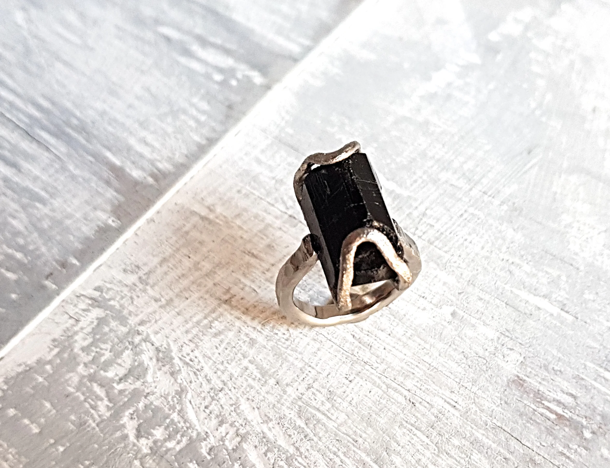 Zjena’s engament ring Palladium and rough black tourmaline in Rock Surface