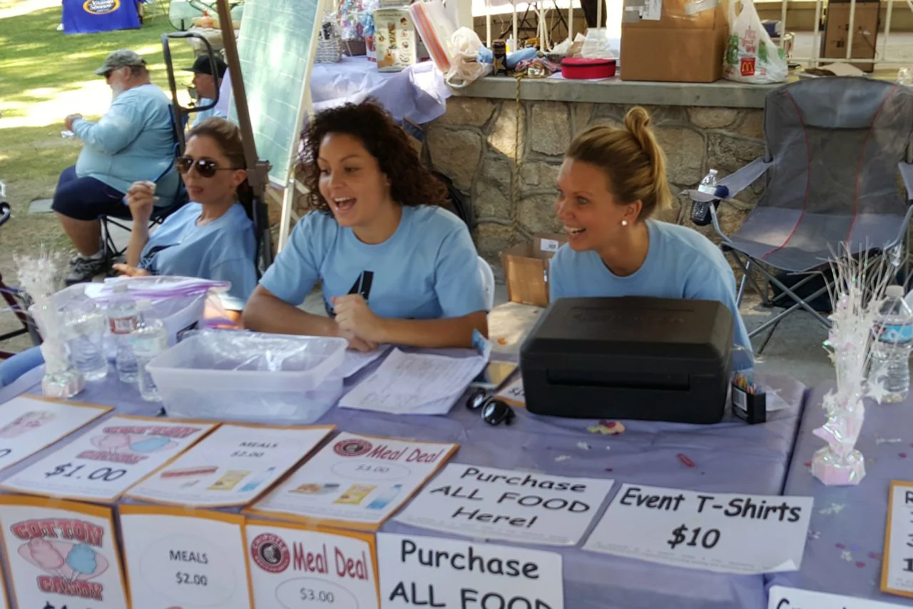 healthsafetyfair-volunteers at table-lowres.jpg