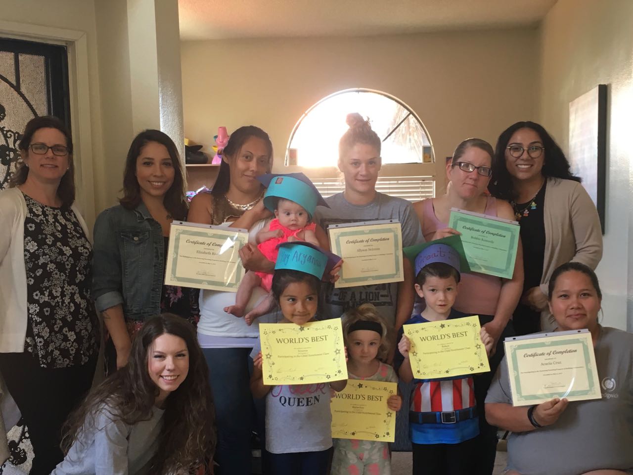 Here are our proud mothers and their children with their completion certificates.