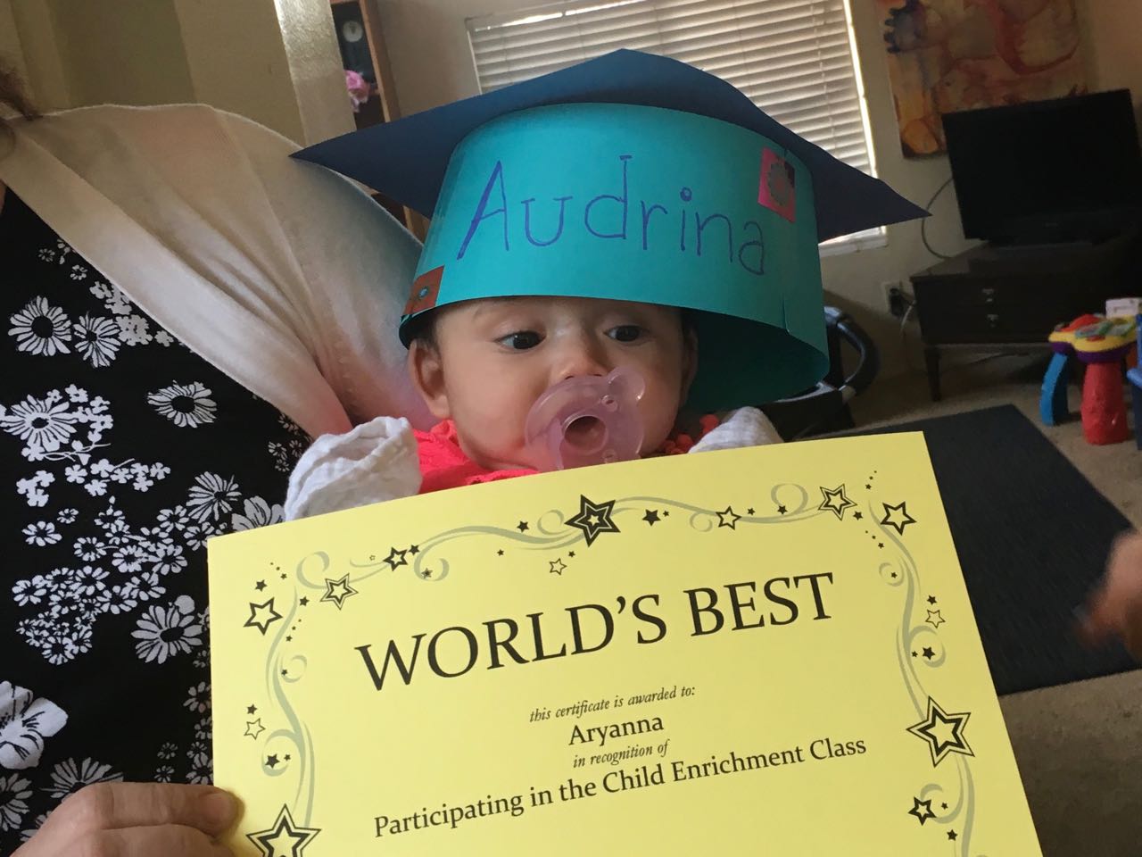 Adrina is very proud of her World's Best award