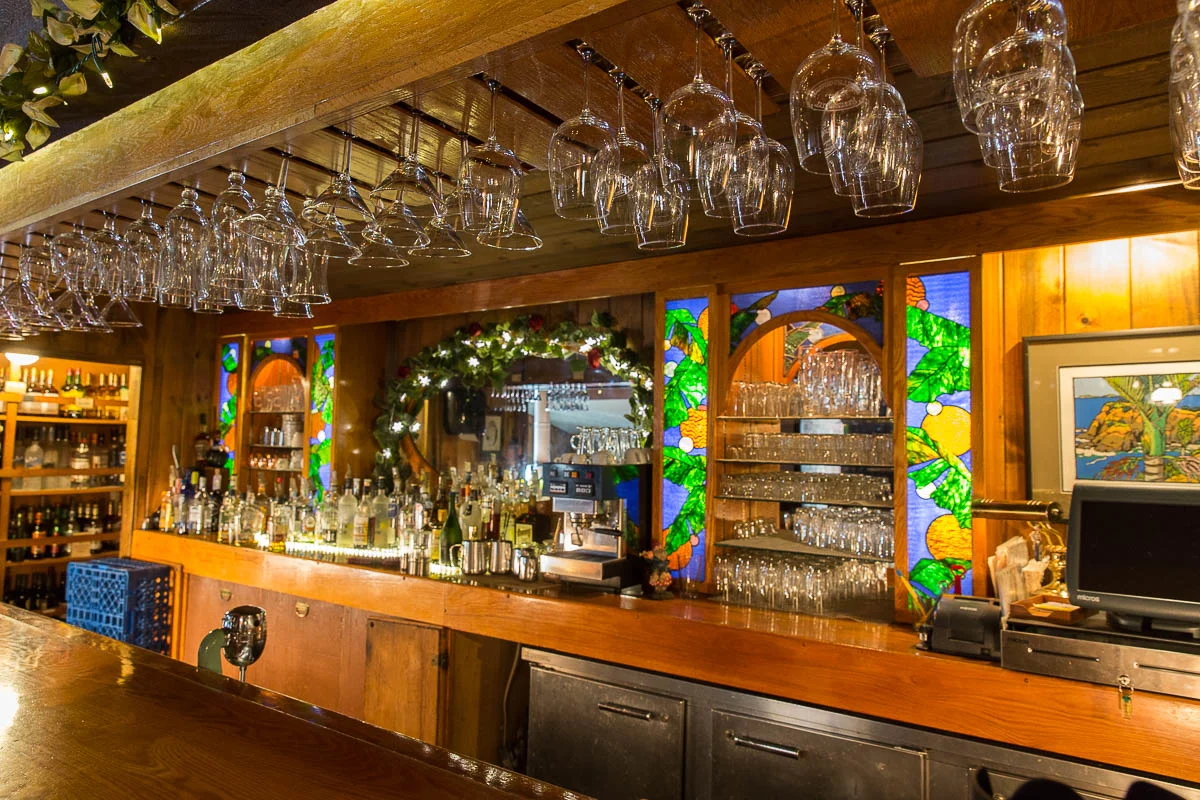 Our   stunning  Bar,  which is located on one side of  THE CAFE , is fully stocked and maintains a large selection of fine wines and beers from around the world.