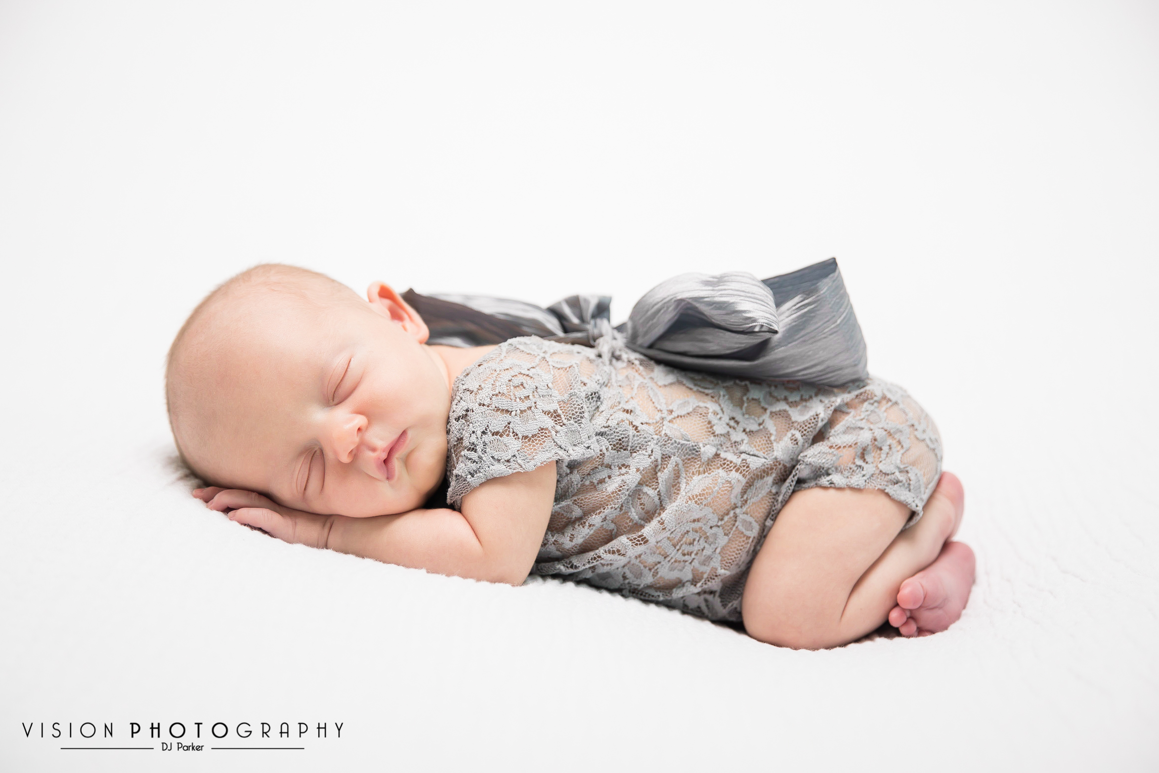 Newborn studio photography bean bag poser