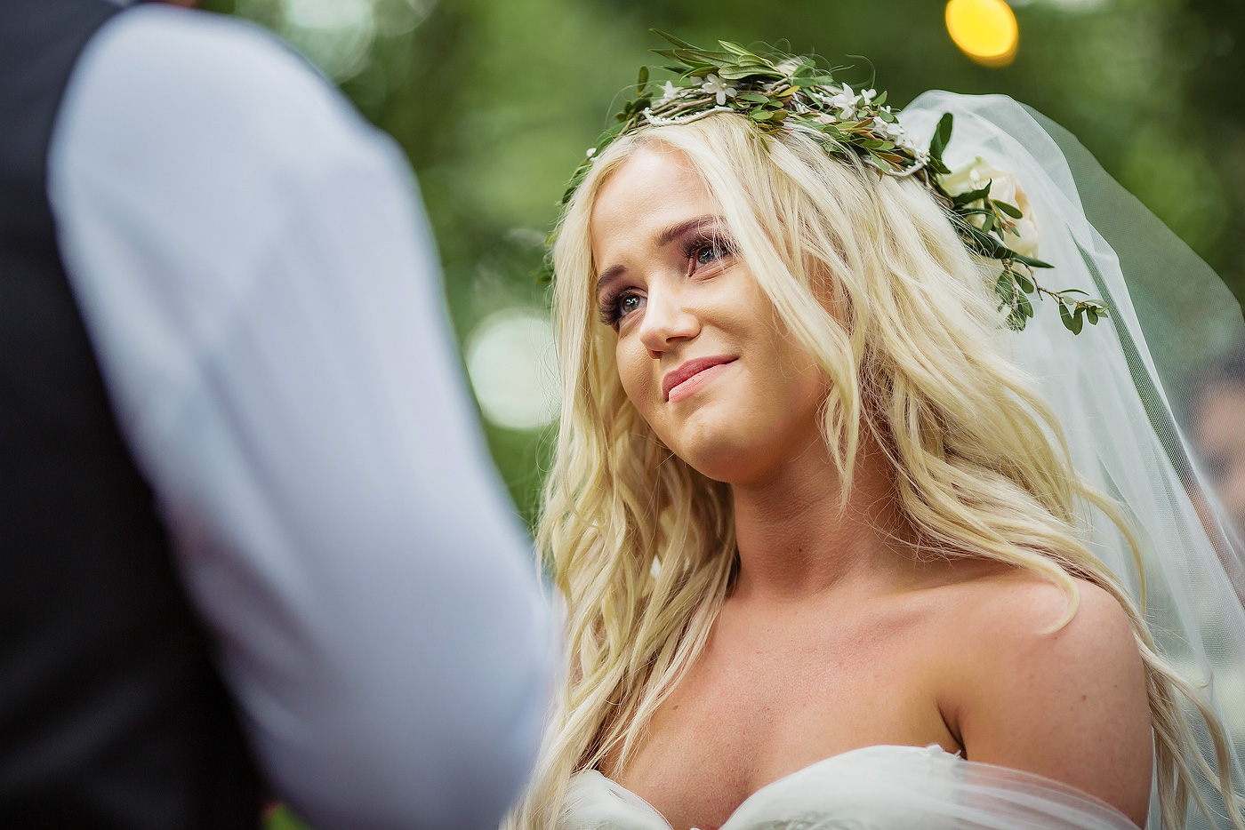 Bride emotions at forest wedding ceremony