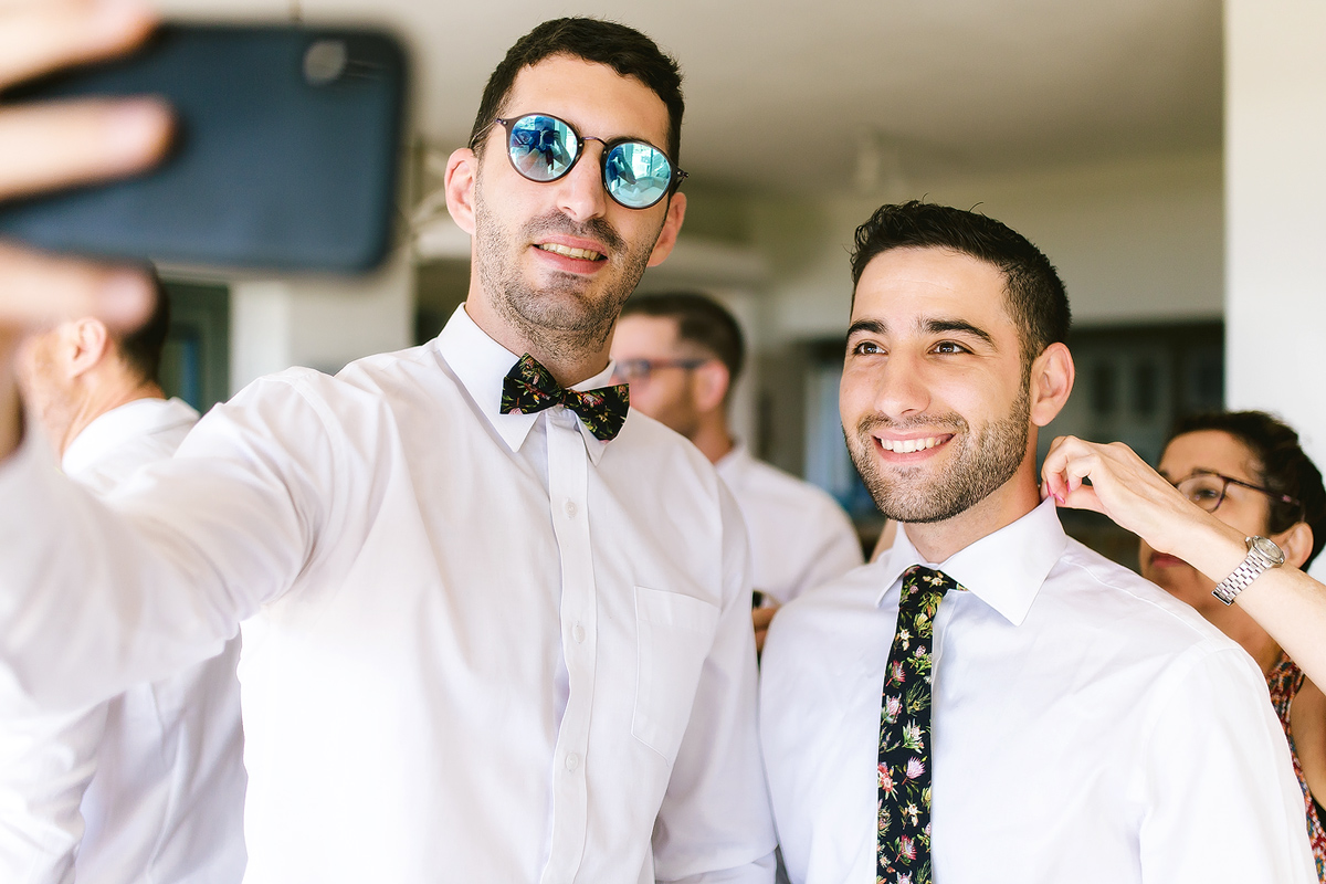 Groom and groomsmen taking a selfie before the Jewish Wedding in South Africa