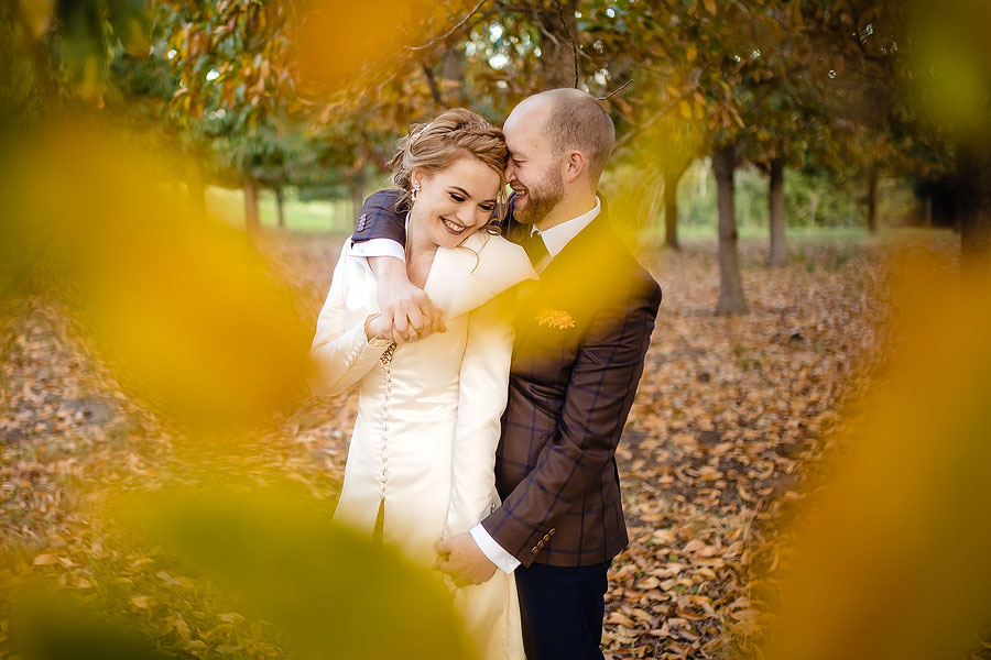 Winter Wedding Portraits with the Autummn leaves falling in Plettenberg Bay.