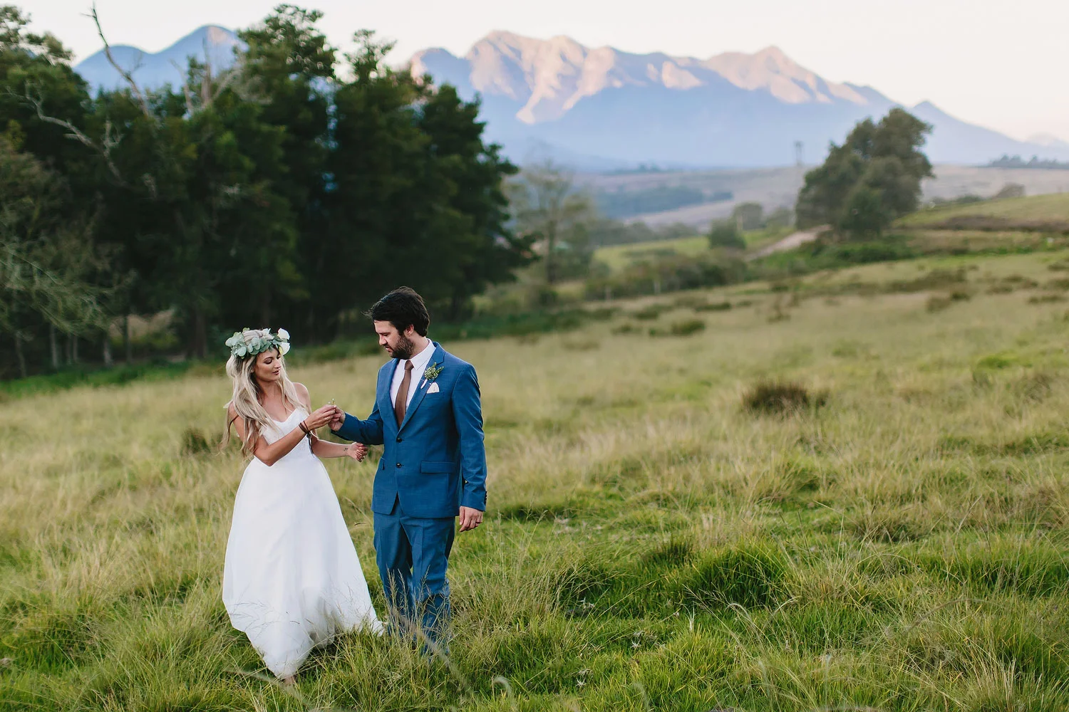 A natural Wedding portrait on a farm venue in George, Western Cape, South Africa with the Outeniqua Mountain as backdrop.