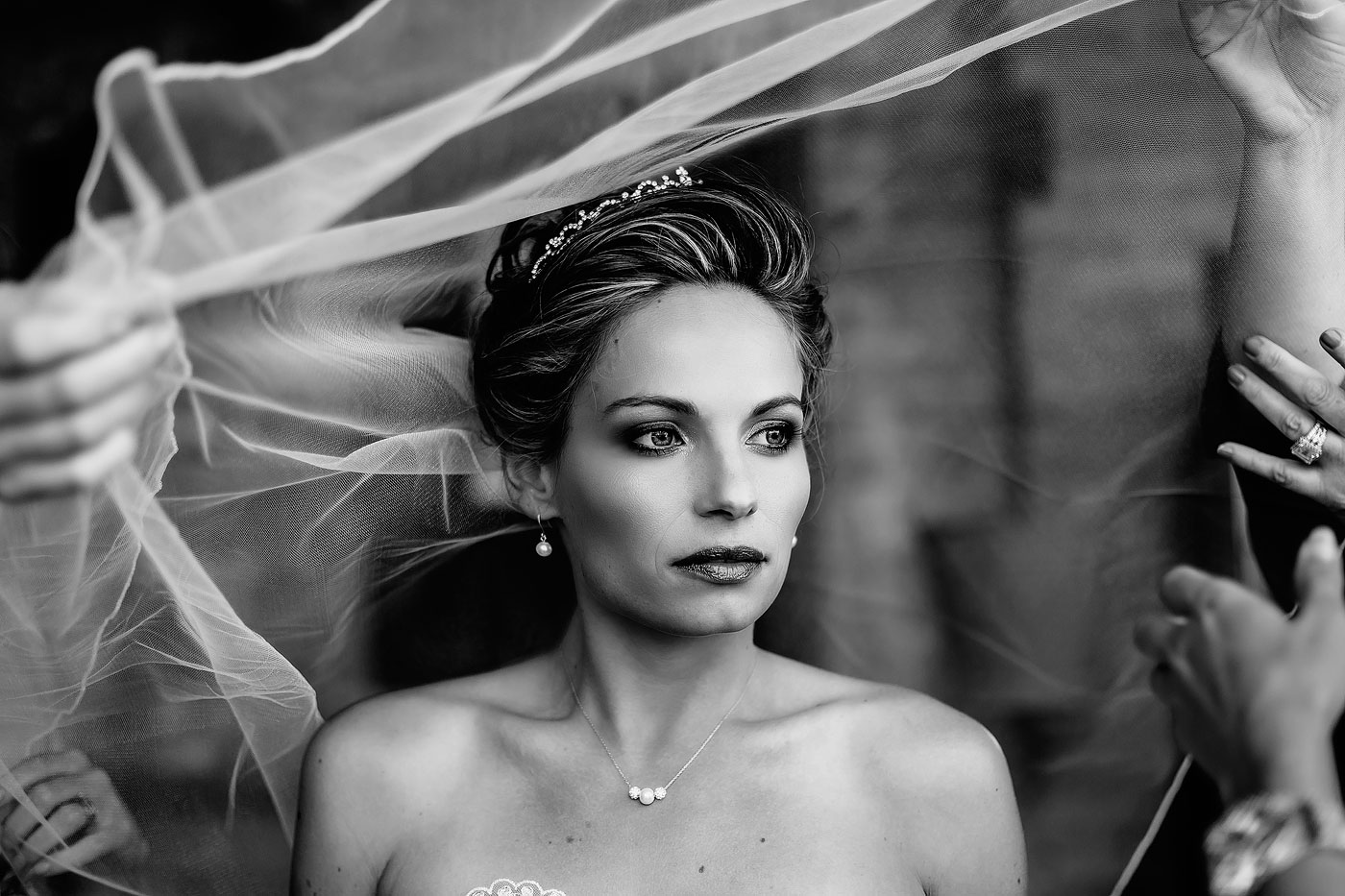 Bride moment before wedding ceremony with veil