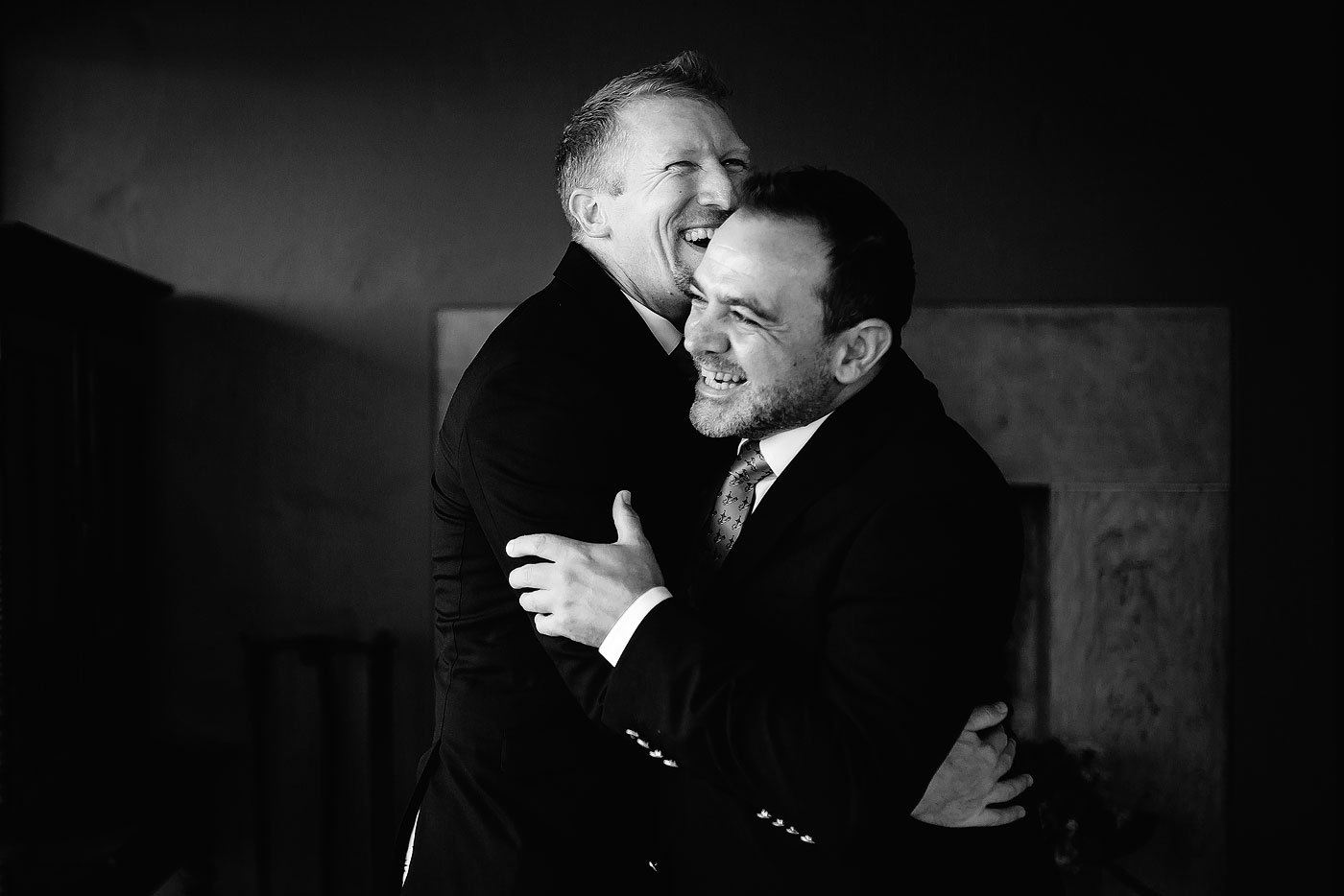 Two Grooms laughing