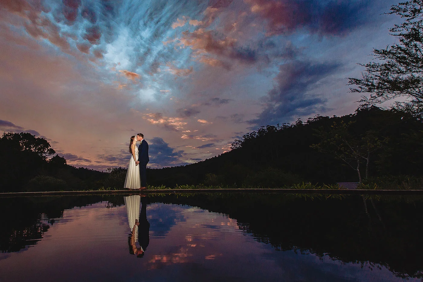 Night Portraits as the sun sets over a pond in Plett