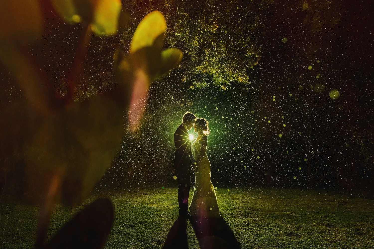 A Wedding Photo at Night in soft rain at a Garden Route Wedding Venue.