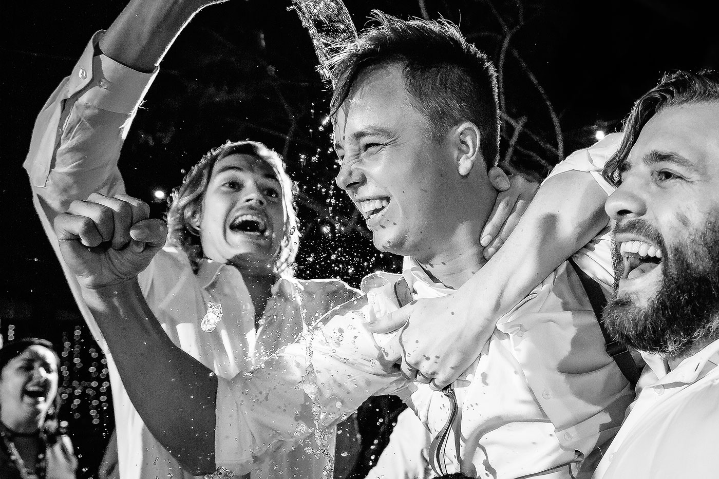 Garter Toss fun moment with the Groomsmen