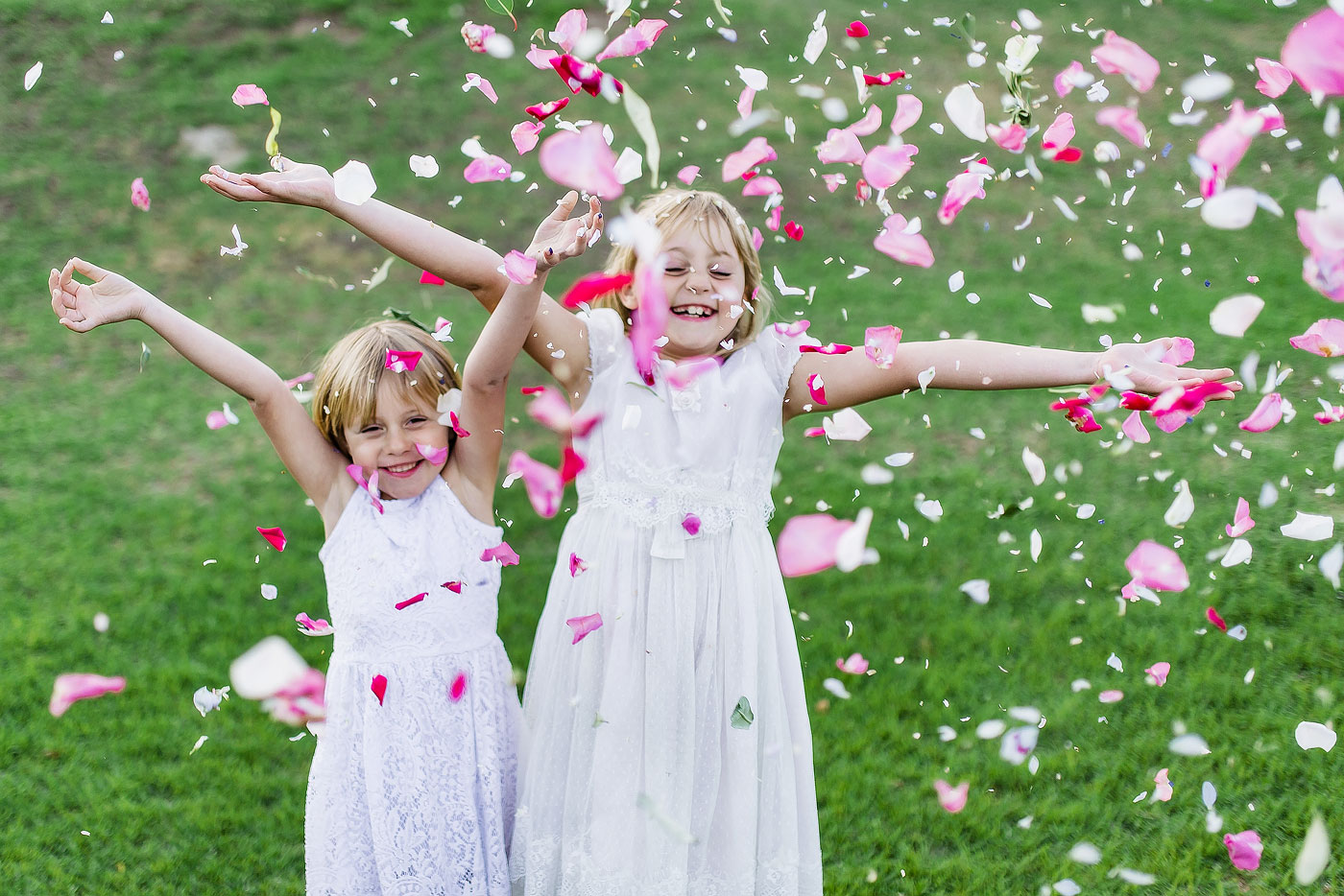 Girls throwing confetti moment