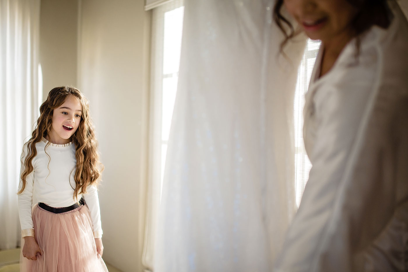 Flowergirl reacts to the wedding dress with Bride