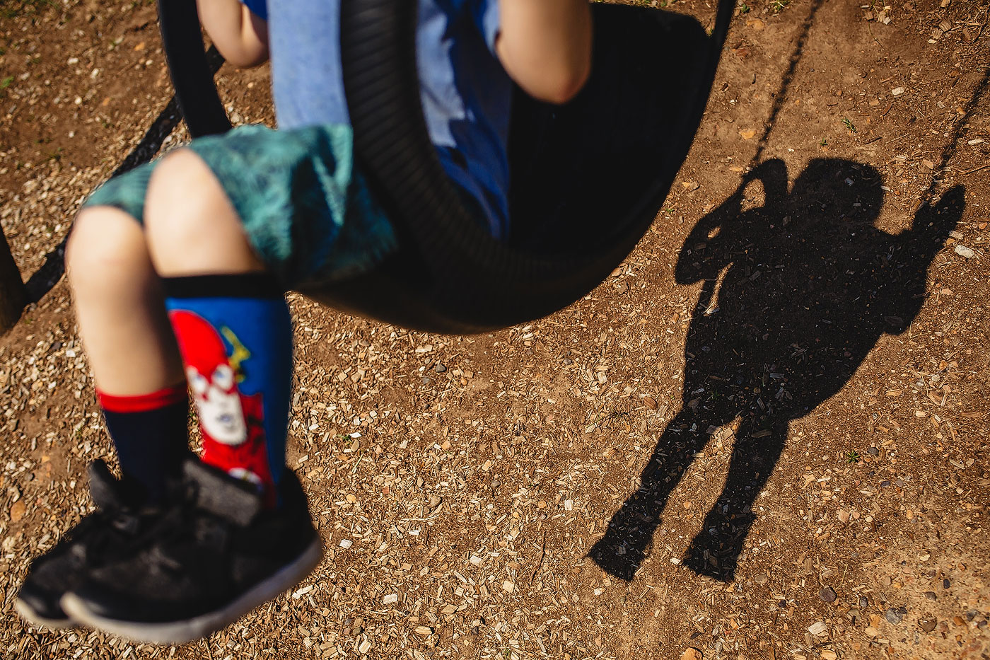 Child on a swing before the wedding