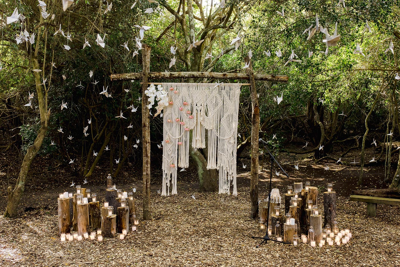 Forest Wedding Decor and Altar with decorations and paper origami cranes.