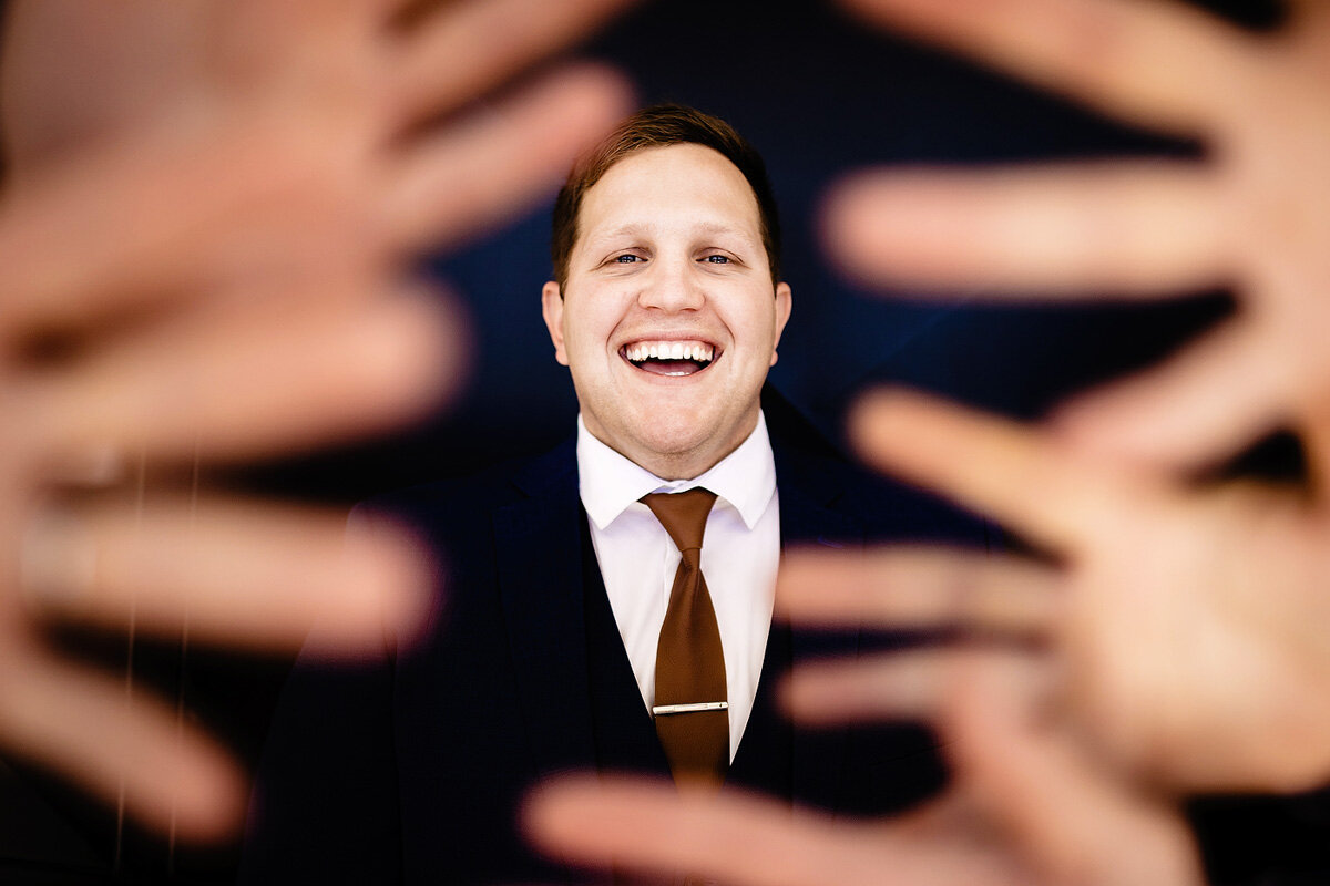 Funny groom wedding portrait
